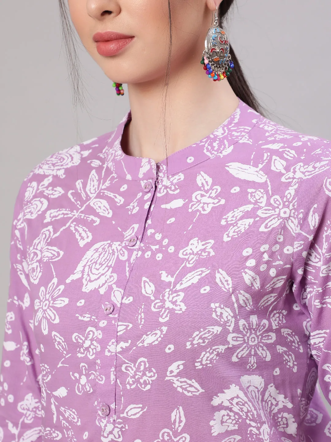 Women Purple Straight Tunic With Three Quaretr Sleeves